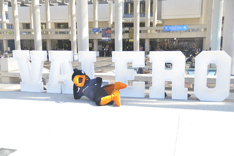 Rowdy in front of letters spelling "Valero".