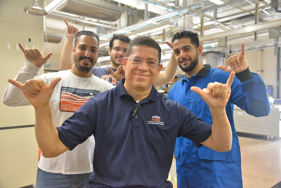 Samer Dessouky, with some of the students in his lab.
