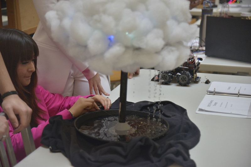 Student working on a floating cloud sensory project