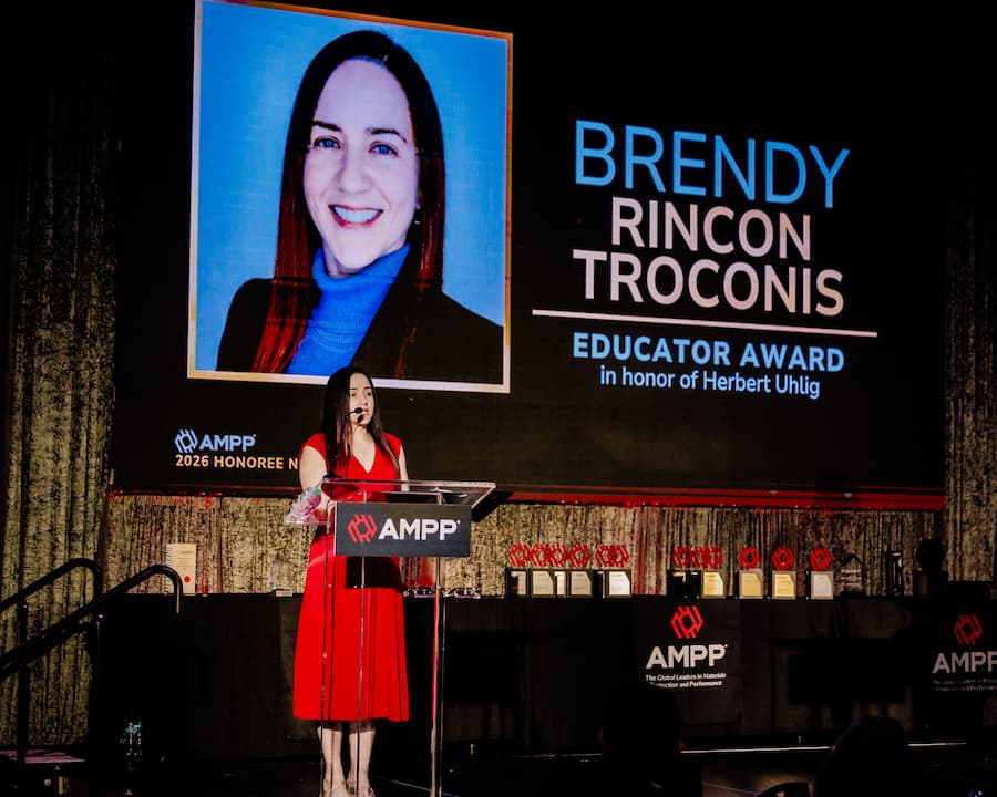 Brendy speaking at the 2026 AMPP Conference.