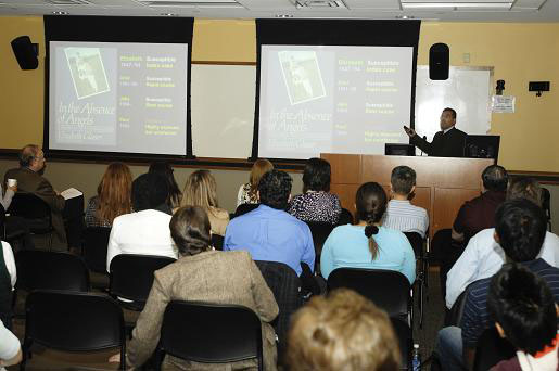 Sunil Ahuja presenting in front of audience