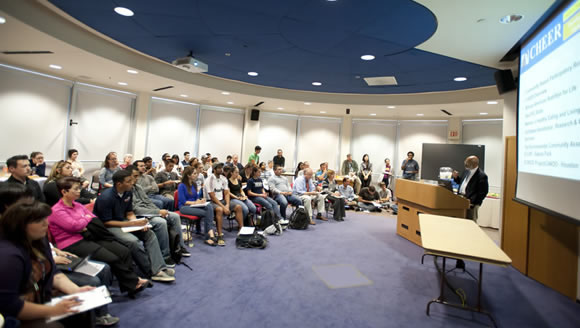 Lovell Jones presenting in front of audience