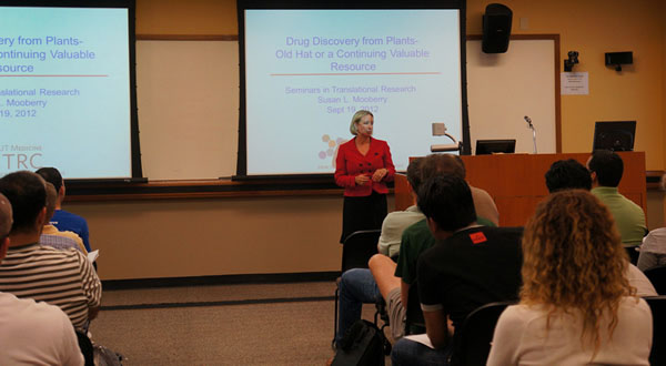 Sue Mooberry presenting in front of audience