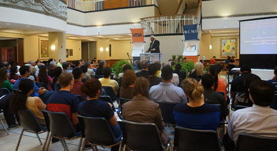 Sidney McNairy, Jr. speaking in front of audience