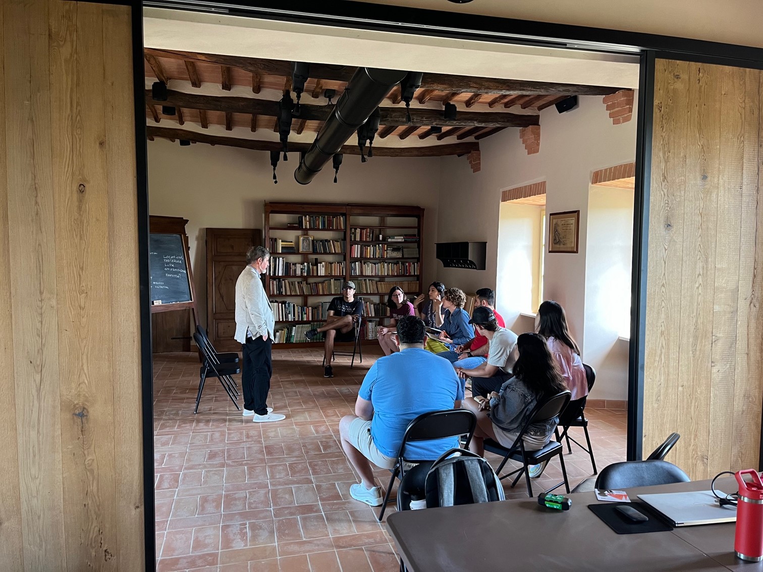 Lecturer talking with students