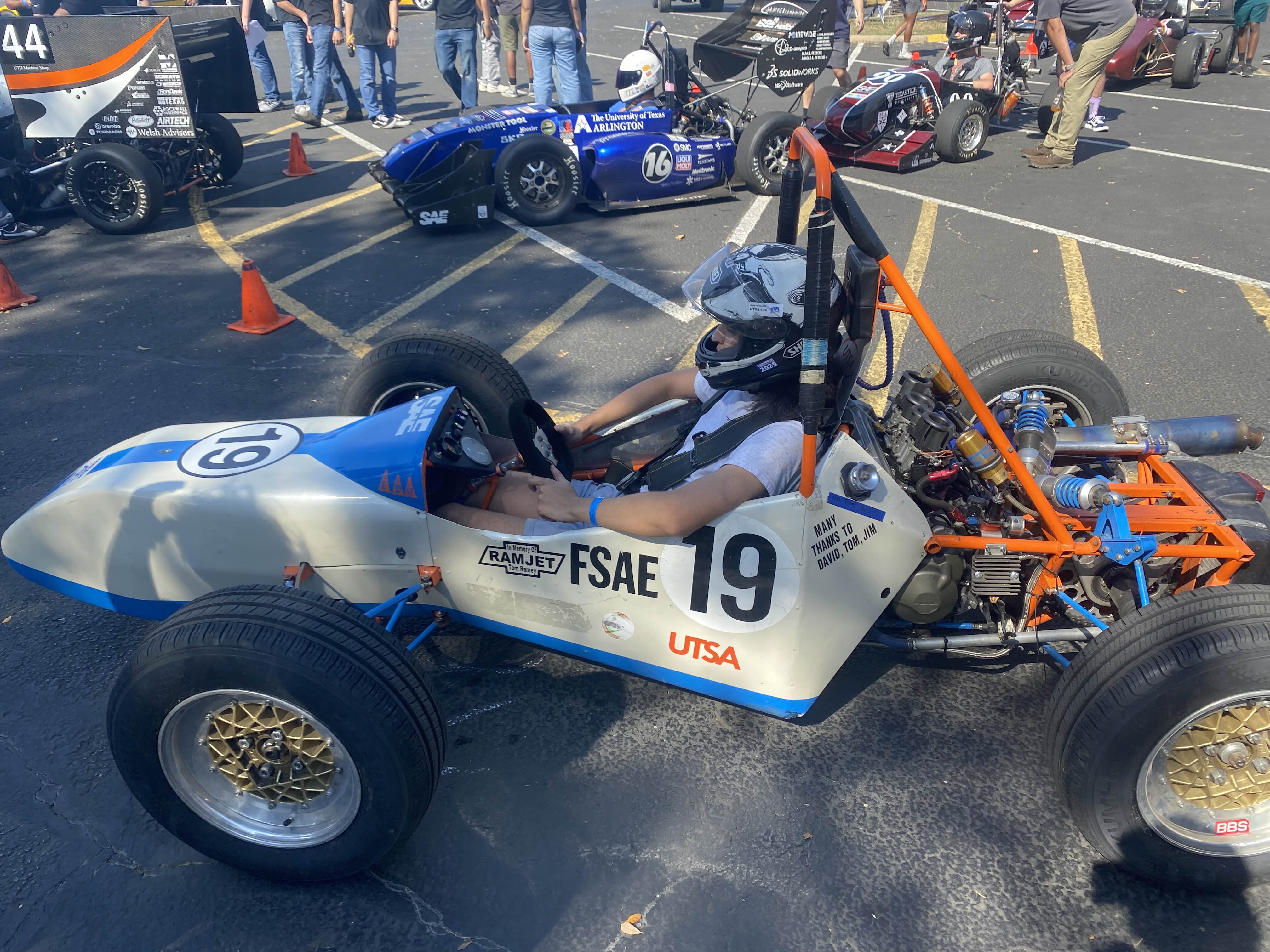 Student in a auto cross car