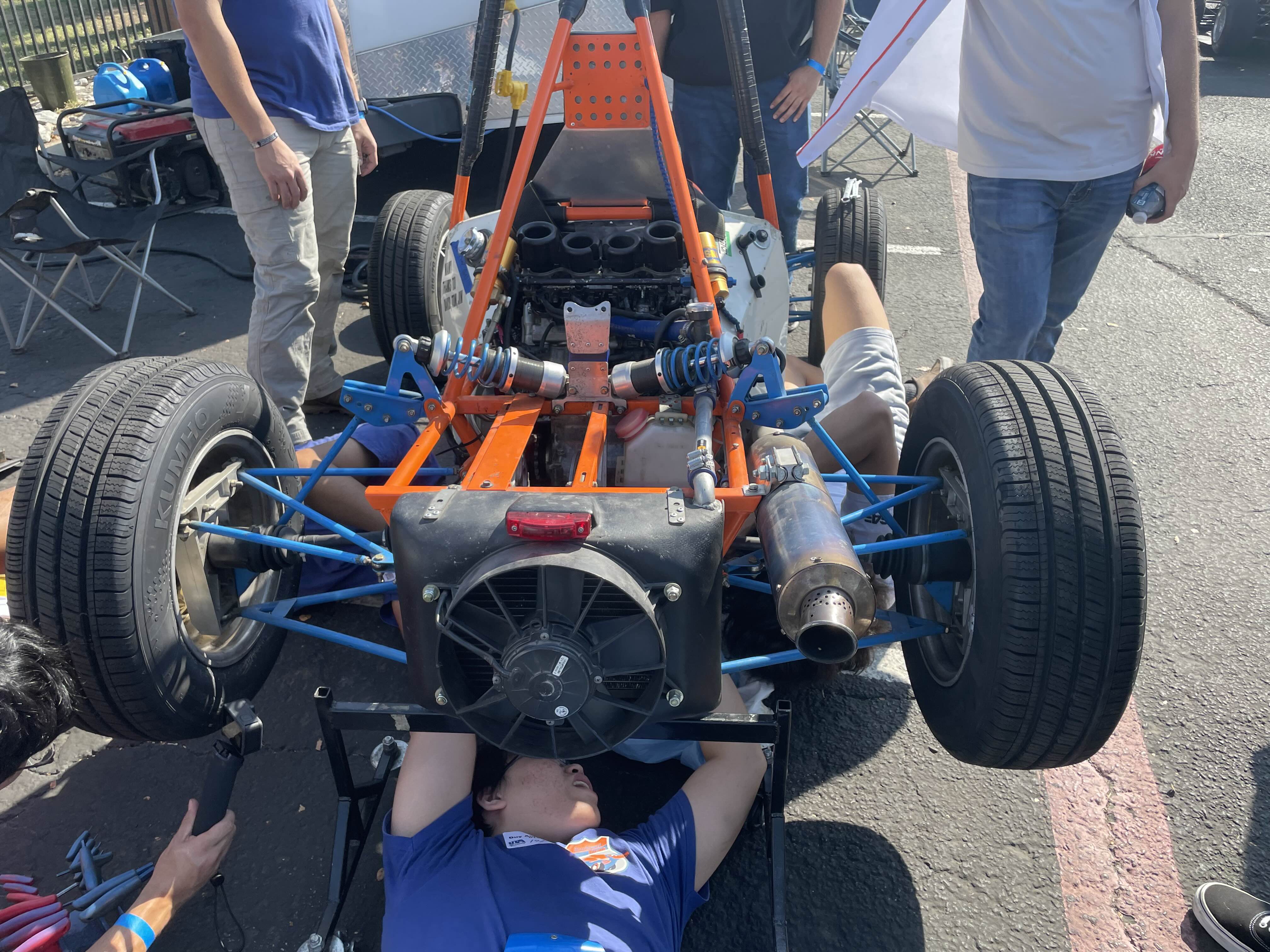 Student working on their car