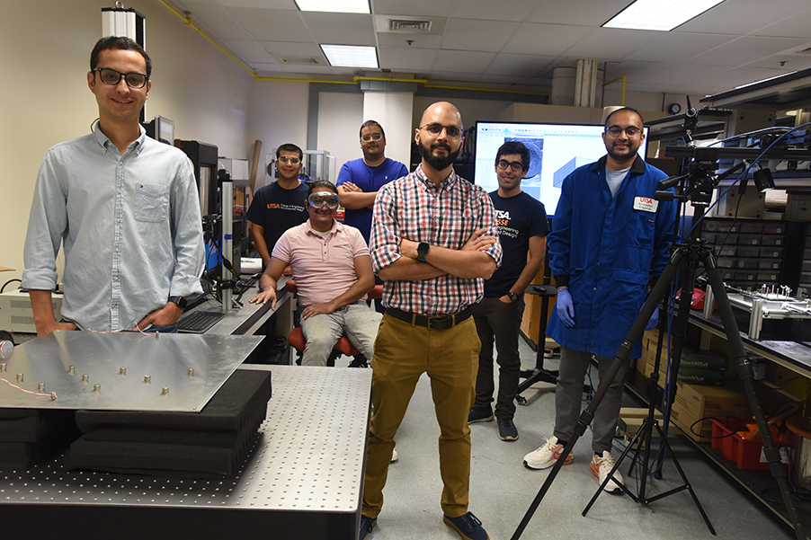 Dr. David Restrepo and his team posing with the ASME Rising Star award