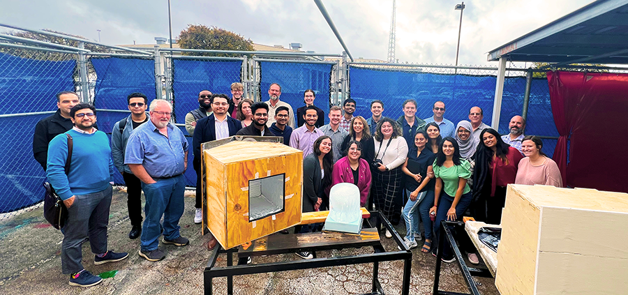 Faculty and students involved in the Mini Ice-Box Challenge working on their designs