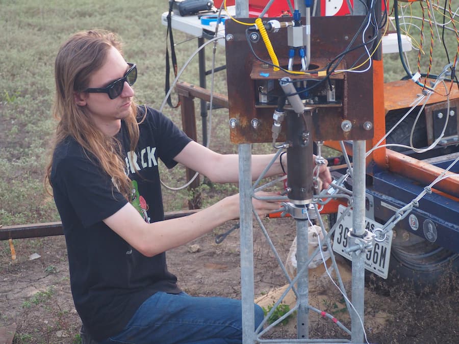 Mechanical engineering major, Haven Russell, working on the team's rocket.