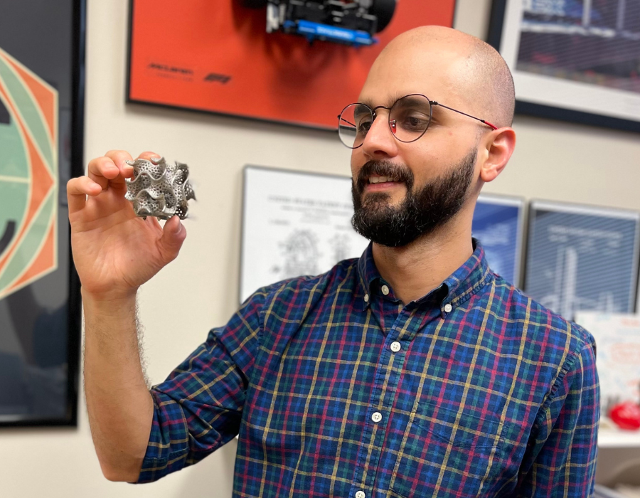 Dr. David Restrepo holding a 3D-printed architected material, representing his work in advanced materials at UTSA.