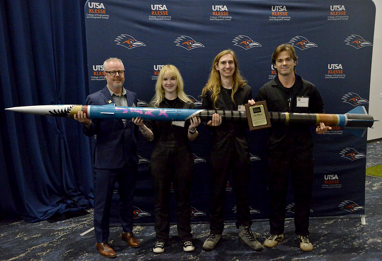 The 1st-place Design II team poses with Dr. Brey at the Tech Symposium