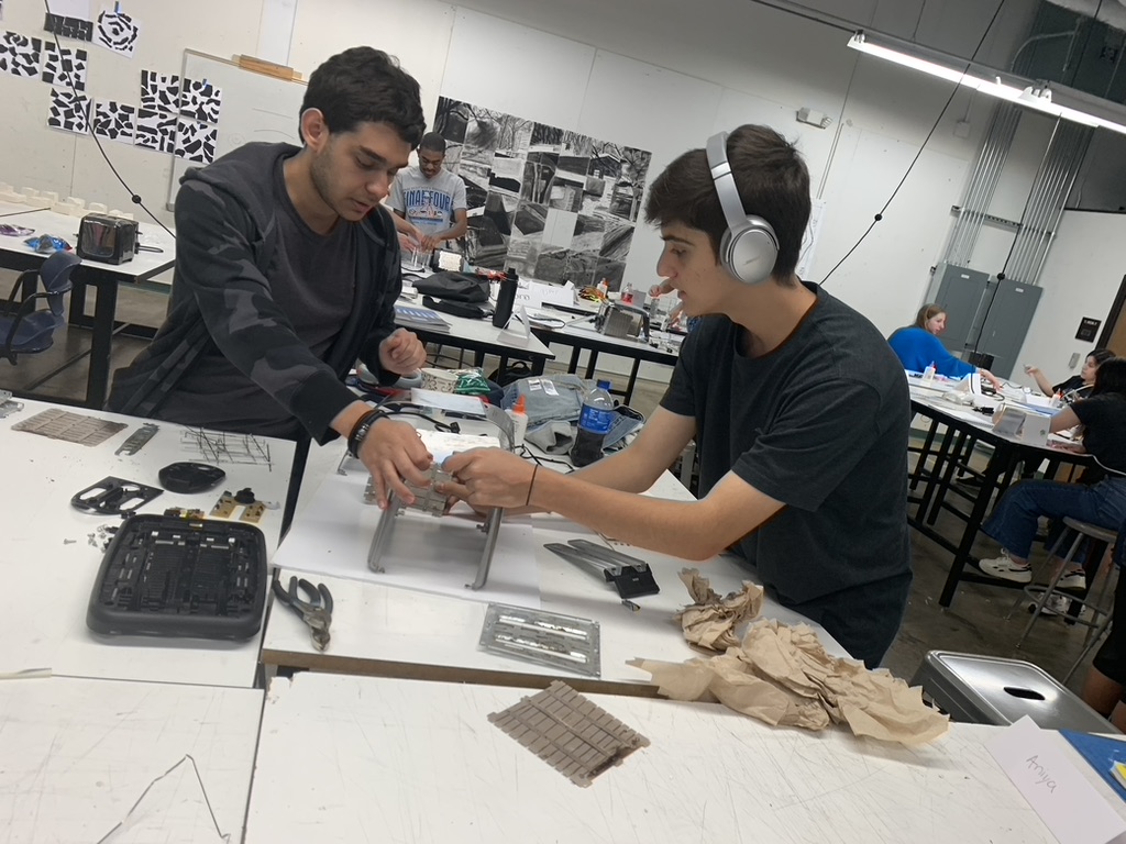 Campers participating in architecture activities.