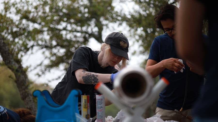 Grace Zimmer working on a rocket.