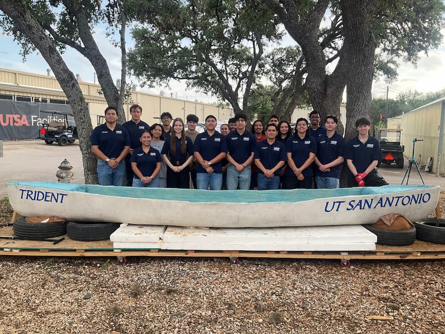 The team with their canoe.