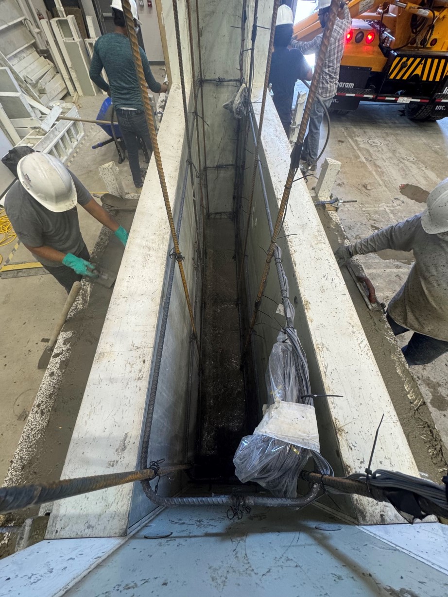 Students conducting a concrete casting